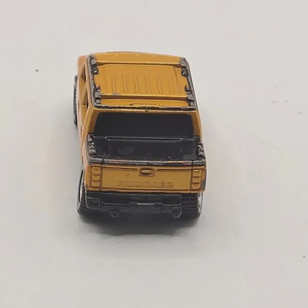 Maisto Hummer H2 Concept 2001 Orange Black Die Cast Car